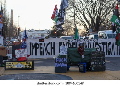 Washington, DC, USA - Jan. 14, 2021: Impeachment signs hang near the White House a few days before the scheduled inauguration of President-Elect Joe Biden.