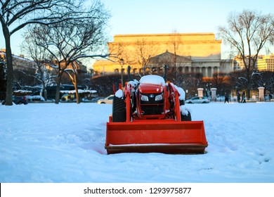 Washington, DC / USA - January 15, 2019: A Small Snow Plow Stands On The National Mall After Winter Storm Gia Blankets The City In Snow. 