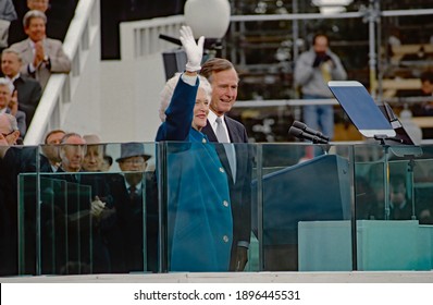 Washington DC, USA, January 20, 1989
Newly sworn in as the 41st President of the United States George H.W.Bush and First Lady Barbara Bush wave from behind the bullet proof glass of the podium 