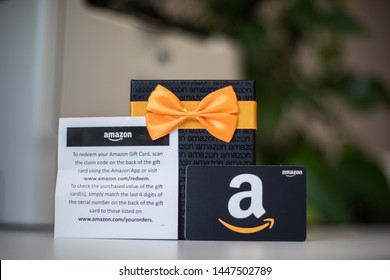 Washington, D.C. / USA - July 10, 2019: A $50 Amazon gift card allows the recipient to purchase items from the Amazon.com website.