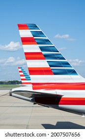 Washington D.C. USA- July 12th, 2021: The tail of American Airline planes at a gate.