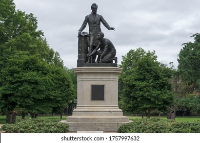 Washington, DC / USA - June 17, 2020: A statue of President Lincoln standing over a freed black slave is the latest statue that is the subject of community action to remove it.  