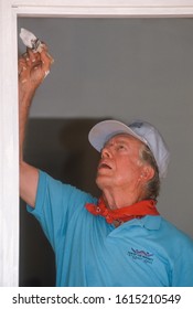 WASHINGTON, DC, USA - JUNE 18, 1992: President Jimmy Carter, Habitat For Humanity, Painting Door Frame During Project On Benning Road.