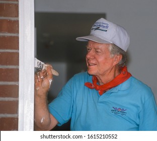 WASHINGTON, DC, USA - JUNE 18, 1992: President Jimmy Carter, Habitat For Humanity, Painting Door Frame During Project On Benning Road.