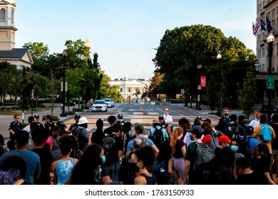 Washington, DC, USA - June 23, 2020: Police Officers Form A Line Blocking Access To Lafayette Square, The Statue Of Andrew Jackson, And Part Of Black Lives Matter Plaza