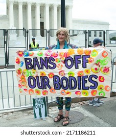 WASHINGTON DC, USA – JUNE 24, 2022:  Protesters gather at the Supreme Court in response to the court’s decision to overturn Roe v. Wade, holding there is no longer a constitutional right to abortion