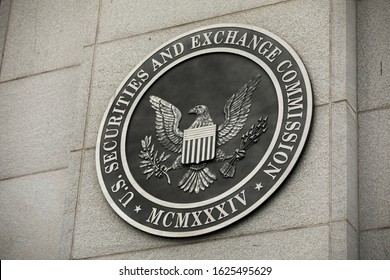Washington DC, USA - June 25, 2018:  US Securities and Exchange Commission building exterior.  The U.S. Securities and Exchange Commission or SEC enforces the federal securities laws
