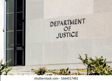 Washington D.C., USA - March 1, 2020: Sign of United States Department of Justice(DOJ) on their headquarters building in Washington, D.C. USA.