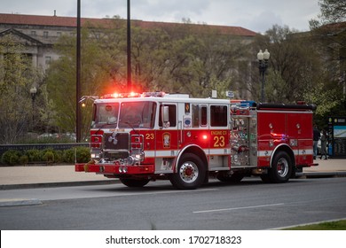 Washington, D.C. / USA - March 19, 2020: A fire truck is parked outside of the National Museum of African American History and Culture during the COVID-19 coronavirus pandemic. 