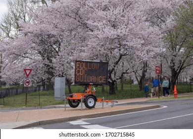 Washington, D.C. / USA - March 23, 2020: A Sign By The National Park Service Warns People To Stay 6 Feet Away From Each Other And Follow CDC Guidance To Prevent The Spread Of The COVID-19 Coronavirus.