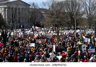 WASHINGTON, DC, USA - MARCH 24, 2018: People demonstrate in the March For Our Lives, a student-led rally, demanding an end to gun violence and responsible firearm control legislation.