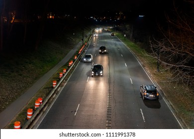 Washington DC, USA - March 9, 2018: Rock Creek And Potomac Parkway NW Aerial View Down Of Highway Road Street At Night By Georgetown In Capital City, Cars In Traffic, Dark