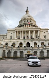 Washington DC, USA - May 02, 2019: United States Capitol Building In Washingon DC. In Front A U.S. Secret Service Car