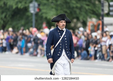 Washington, D.C., USA - May 28, 2018: The National Memorial Day Parade, Man Dress Up As Soldier Of The American Revolution Walks Down Constitution Avenue.