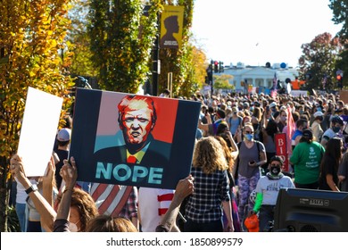 Washington, DC, USA / November 7, 2020. People gather at Black Lives Matter Plaza near the White House to celebrate after Joe Biden is announced President-Elect. 