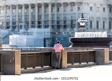 Washington DC, USA - October 12, 2018: People Business Worker Standing On Capitol Hill By Building In District Of Columbria During Sunny Autumn Day On Break Leaning On Railing