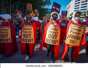 WASHINGTON D.C., USA - OCTOBER 17, 2020: Women Dressed As Handmaids March At The Women's March To Protest The Nomination Of Amy Coney Barrett.