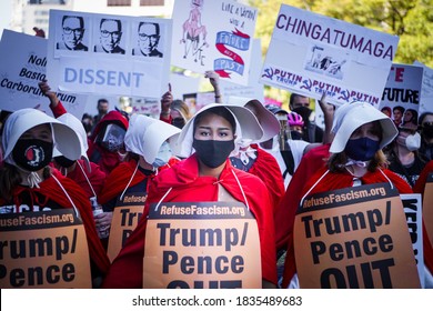 WASHINGTON D.C., USA - OCTOBER 17, 2020: Women Dressed As Handmaids Stand In Front Of The Crowd At The Women's March To Protest The Nomination Of Amy Coney Barrett.