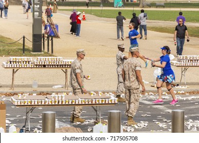 Washington D.C, USA, october 30, 2016: Marines offering refreshment for Runners competing in the Marine Corps Marathon in Washington, D.C