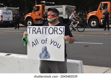 Washington, DC, USA - September 18, 2021: “Traitors All Of You,” Sign Held By A Male Protester Wearing A Wonder Woman Mask At The Justice For J6 Protest