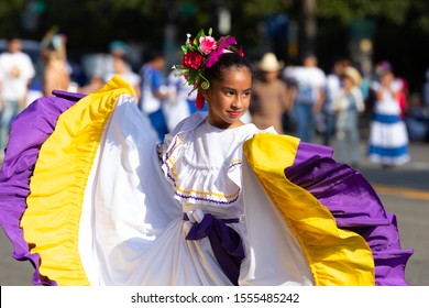 Washington DC, USA - September 21, 2019: The Fiesta DC, Honduran dancers wearing traditional dresses, performing dances from Honduras during the parade