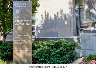 Washington DC, USA-June 5, 2018: Robert F Kennedy Department Of Justice Building Sign With Landscaping