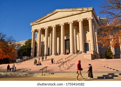 Washington DC, USA-November 2019; Low Angle View During The Golden Hour In Late Fall Of The Stairs Leading To The National Gallery Of Art With Some Foliage On The Trees