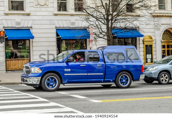 Washington DC, VA, USA - Dec 28th 2014: Blue\
Dodge RAM 1500 Truck on the Road in Washington DC. Urban Street\
Photography. American\
Automotives