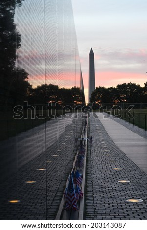 Washington DC - The Vietnam Veterans Memorial Wall and Washington Monument at sunrise 