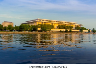 Washington DC--July 18, 2018; View Of The John F Kennedy Center For The Performing Arts From On Potomac River At Sunset With Building Illuminated In Sunlight