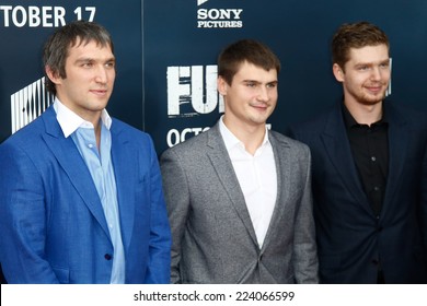 WASHINGTON, DC-OCT 15: NHL Players Alex Ovechkin (L), Dmitry Orlov (C) And Evgeny Kuznetsov Of The Washington Capitals At 