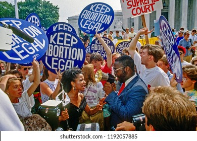 Washington DC.,USA, April 26, 1989.
Supporters for and against legal abortion face off during a protest outside the United States Supreme Court Building during Webster V Health Services 