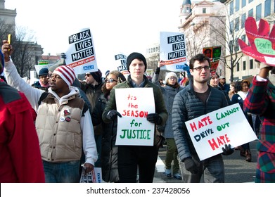 WASHINGTON - DECEMBER 13: Protesters March Against Police Shootings And Racism During A Rally In  Washington, DC On December 13, 2014 