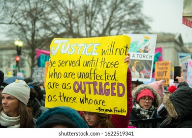 WASHINGTON JANUARY 18, 2020: Demonstrators rally in support of women’s rights and urge America to vote President Trump out in the 2020 election at the Women’s March on January 18, 2020 in Washington, 