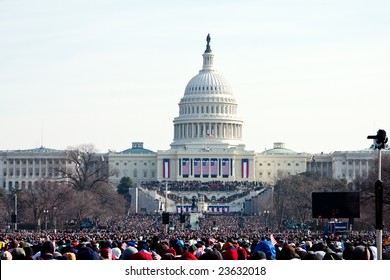 WASHINGTON - JANUARY 20: People marching towards the US Capitol building where President-elect Barack Obam will be inaugurated on January 20, 2009 in Washington.