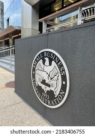 WASHINGTON - JULY 27, 2022: SBA Small Business Administration Sign Coat Of Arms At Headquarters Building Entrance In DC