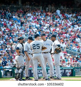 WASHINGTON- JUNE 16:  Yankees Players Confer On The Mound At Their Game Against The Washington Nationals On June 16, 2012 In Washington, D.C.