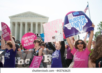 WASHINGTON JUNE 27:  A pro-choice activist holds a Planned Parenthood sign while awaiting the Supreme Courtâ??s ruling on abortion access in front of the Supreme Court in Washington, DC on June 27, 2016