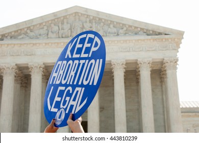 WASHINGTON JUNE 27:  A Pro-choice activist holds a sign in front of the Supreme Court in Washington, DC on June 27, 2016