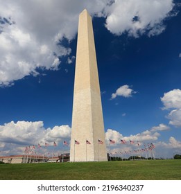 Washington Monument With Blue Sky And Clouds