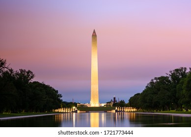 Washington Monument with brilliant sunrise over reflecting pool, Washington DC, USA - Powered by Shutterstock