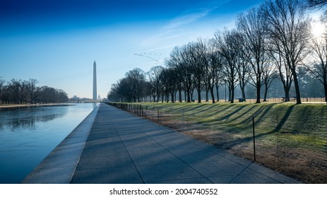 Washington Monument At National Mall At Dawn,Washington Monument On The Reflecting Pool In Washington DC, USA 