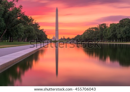 Washington Monument on the Reflecting Pool in Washington, DC at dawn.