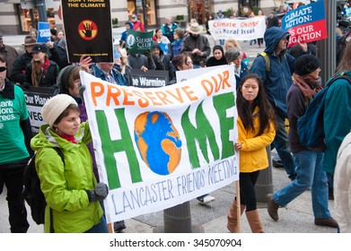 WASHINGTON - NOVEMBER 29:  Marchers Hold A Sign At The Global Climate March In Washington, DC On November 29, 2015, The Eve Of The United Nations Climate Change Conference In Paris.