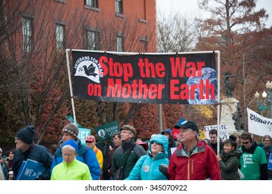 WASHINGTON - NOVEMBER 29:  Marchers Take Part In The Global Climate March In Washington, DC On November 29, 2015, The Eve Of The United Nations Climate Change Conference In Paris.