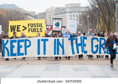 WASHINGTON - NOVEMBER 29: Marchers Take Part In The Global Climate March In Washington, DC On November 29, 2015, The Eve Of The United Nations Climate Change Conference In Paris.