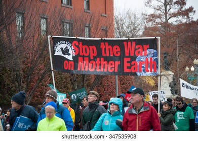 WASHINGTON - NOVEMBER 29: Marchers Take Part In The Global Climate March In Washington, DC On November 29, 2015, The Eve Of The United Nations Climate Change Conference In Paris.