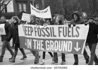 WASHINGTON - NOVEMBER 29: Marchers Take Part In The Global Climate March In Washington, DC On November 29, 2015, The Eve Of The United Nations Climate Change Conference In Paris.