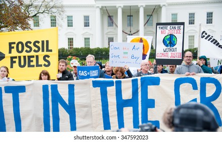 WASHINGTON - NOVEMBER 29: Marchers Take Part In The Global Climate March In Washington, DC On November 29, 2015, The Eve Of The United Nations Climate Change Conference In Paris.