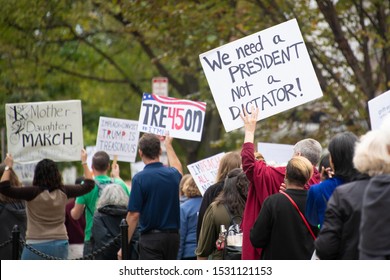 WASHINGTON – OCTOBER 13: Partipants in the March to Impeach call for the impeachment of President Donald Trump in Washington, DC on October 13, 2019